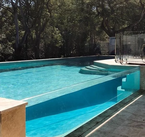 What are the benefits of a rooftop acrylic pool at a hotel?